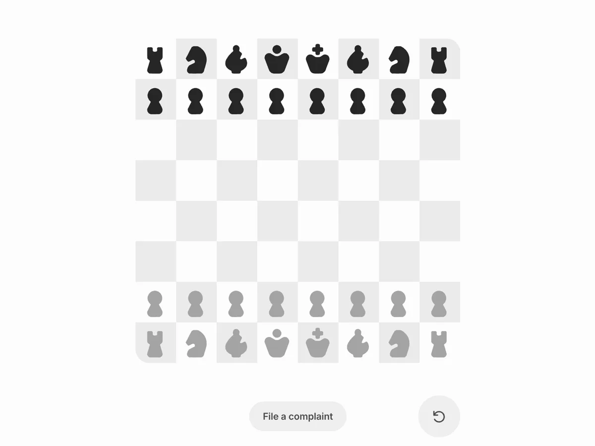 The Impossible Chess board set up for a new game, with a 'File a complaint' button below
